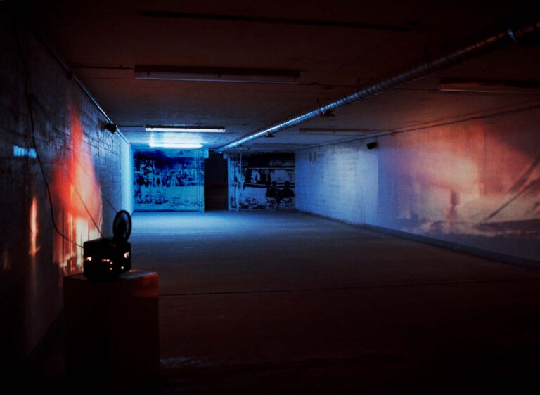 BombenBunkerStimmung; Gelatine Print on Wall, 200 x 500 cm appr., Filmloops from World War II, Sound, At the exhibition Zeit, organised by GaDeWe in one of Bemen's Air Raid Shelters from the Second World War, Bremen, 2000