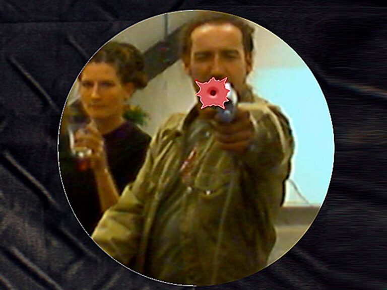 Joachim Seinfeld: Ego Shooter – Friendly Fire, First Version (Screen Shot), 2004 Installation with Computer, Monitor and Light Gun at the exhibition SeinfeldIMmeinblau, 2004 In the backgroung works from Holiday Paradise or All the Way to Bihac