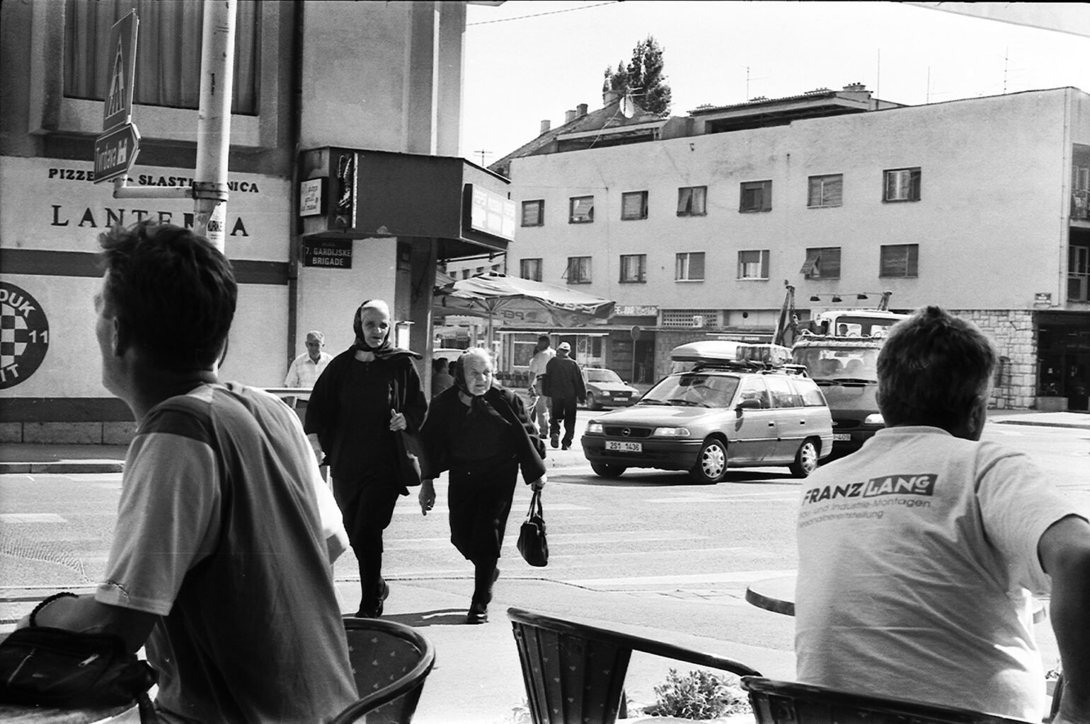 Holiday Paradise or All the Way to Bihac; 2005 At a Café in Knin Analog Black & White Photograph