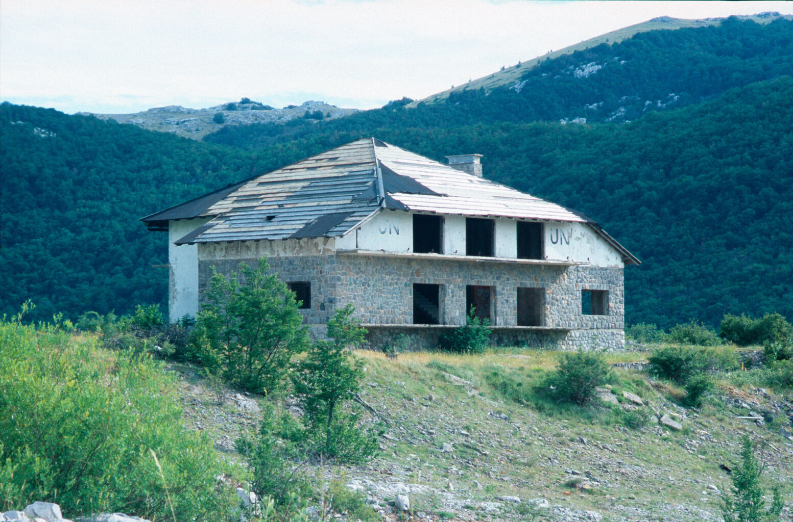 Holiday Paradise or All the Way to Bihac; 2005 Not finished, Building with UN-Inscription Analog Colour Photograph